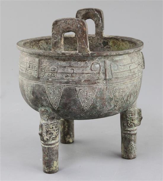 A Chinese archaistic bronze tripod ritual food vessel, Ding, early Western Zhou dynasty style, 19cm high, 16cm wide